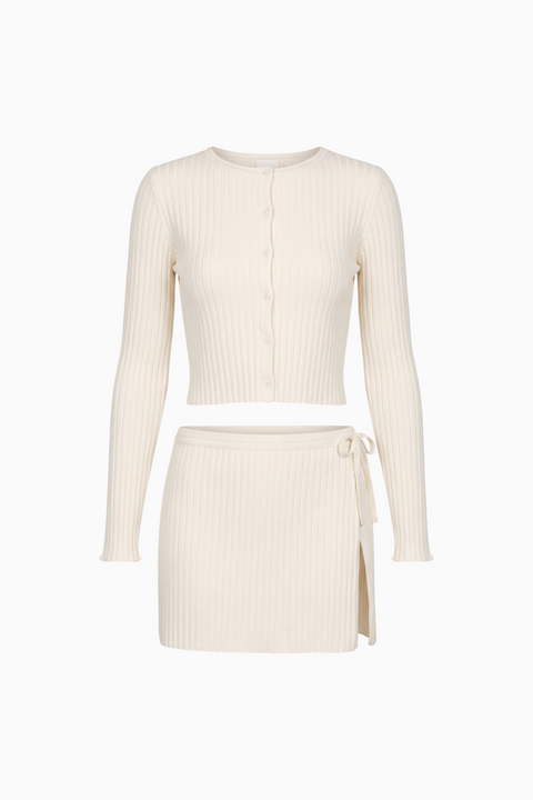 Ensemble gilet et mini-jupe en maille côtelée
