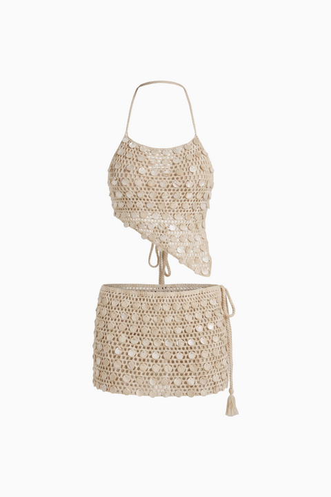 Ensemble deux pièces jupe et haut de bikini brodé de pièces en crochet