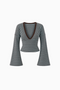 Top in maglia a righe con maniche svasate