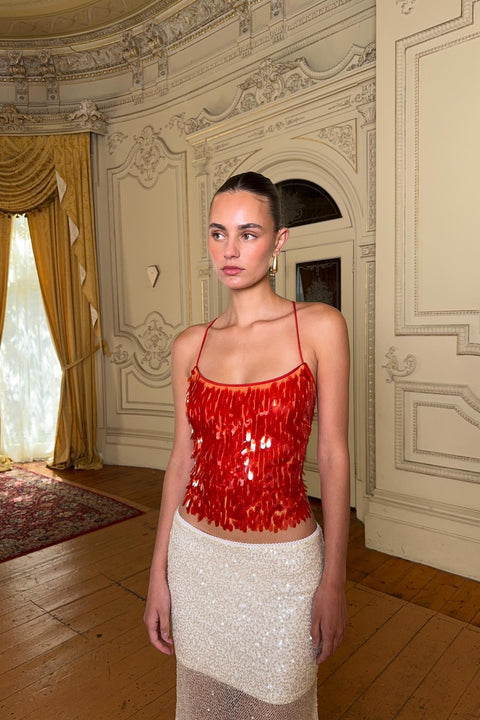Haut à sequins orange 10 ?