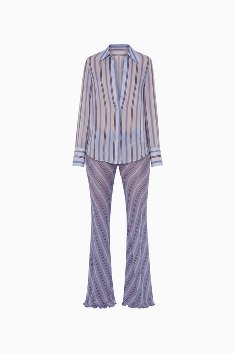 Completo a due pezzi con camicia trasparente a righe e pantaloni a gamba larga