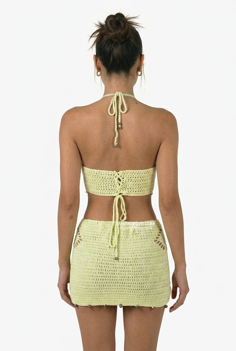 Vestido mini de croché verde matcha com recortes