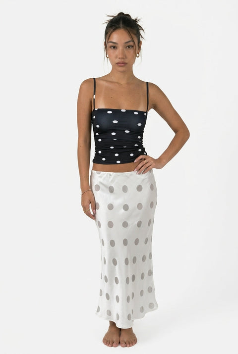 Jupe à pois en satin blanc