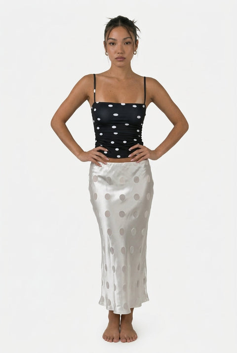 Jupe à pois en satin blanc