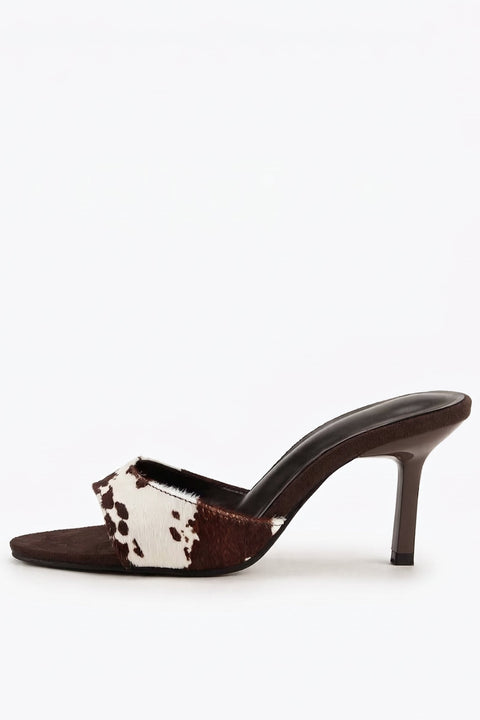 Mules à talons aiguilles imprimé vache