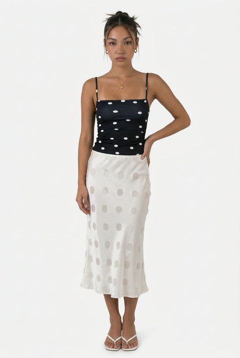 Jupe à pois en satin blanc