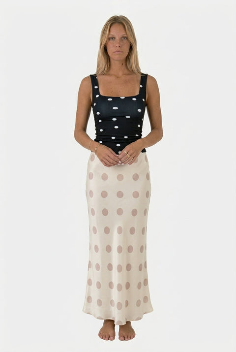 Jupe à pois en satin blanc
