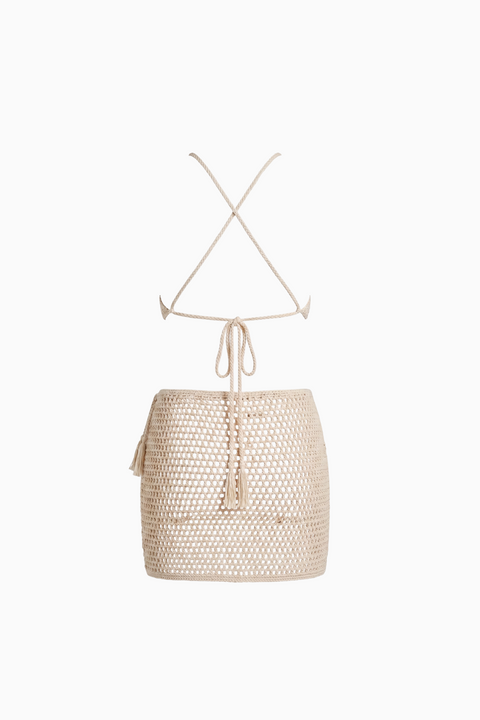 Set a due pezzi con gonna all’uncinetto e decorazioni a forma di moneta