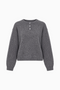 Pull en maille à col boutonné