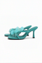 Vibrante türkise Pailletten-Stilettosandalen