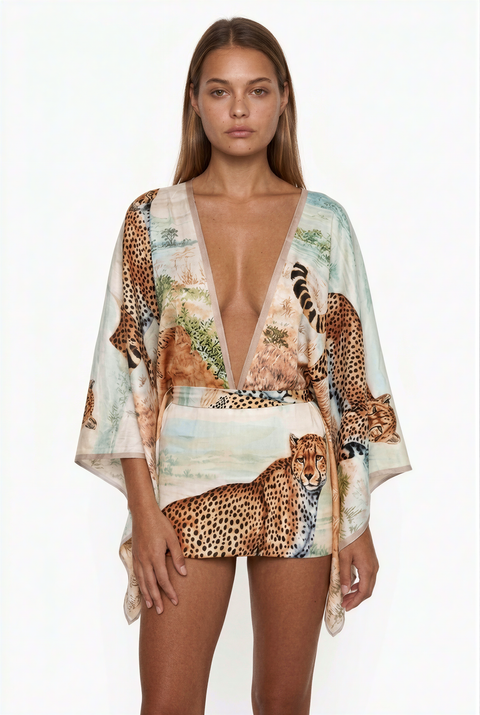 Abito da resort con scollo a V profondo e stampa leopardata paesaggistica