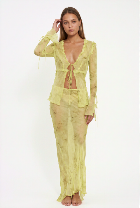 Conjunto maxi transparente com padrão abstrato e laço à frente