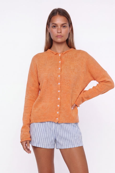 Soft pink button-up knit cardigan