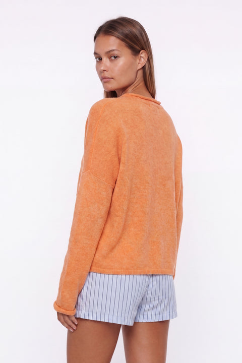Soft pink button-up knit cardigan