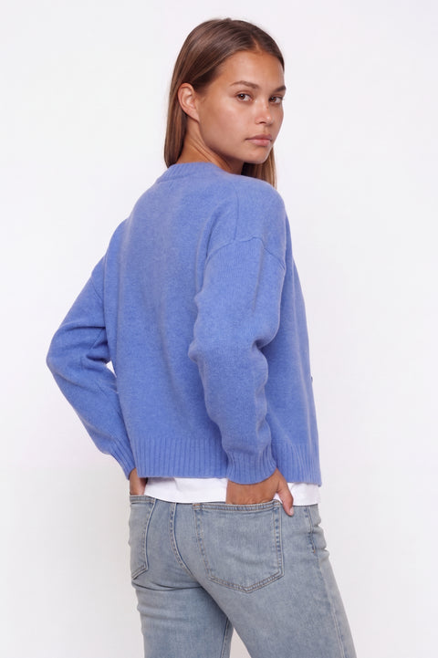 Gilet en tricot boutonné bleu à col rond